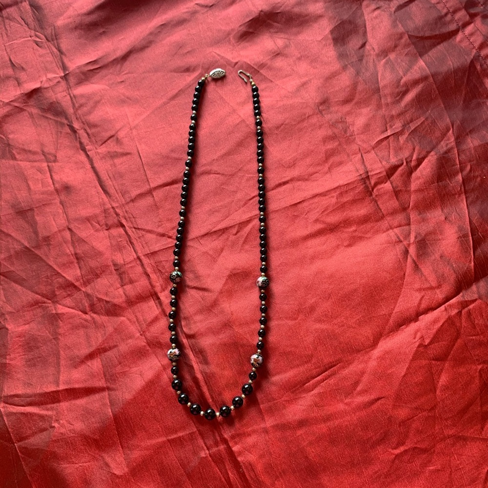 Vintage glass bead black and gold tone necklace.